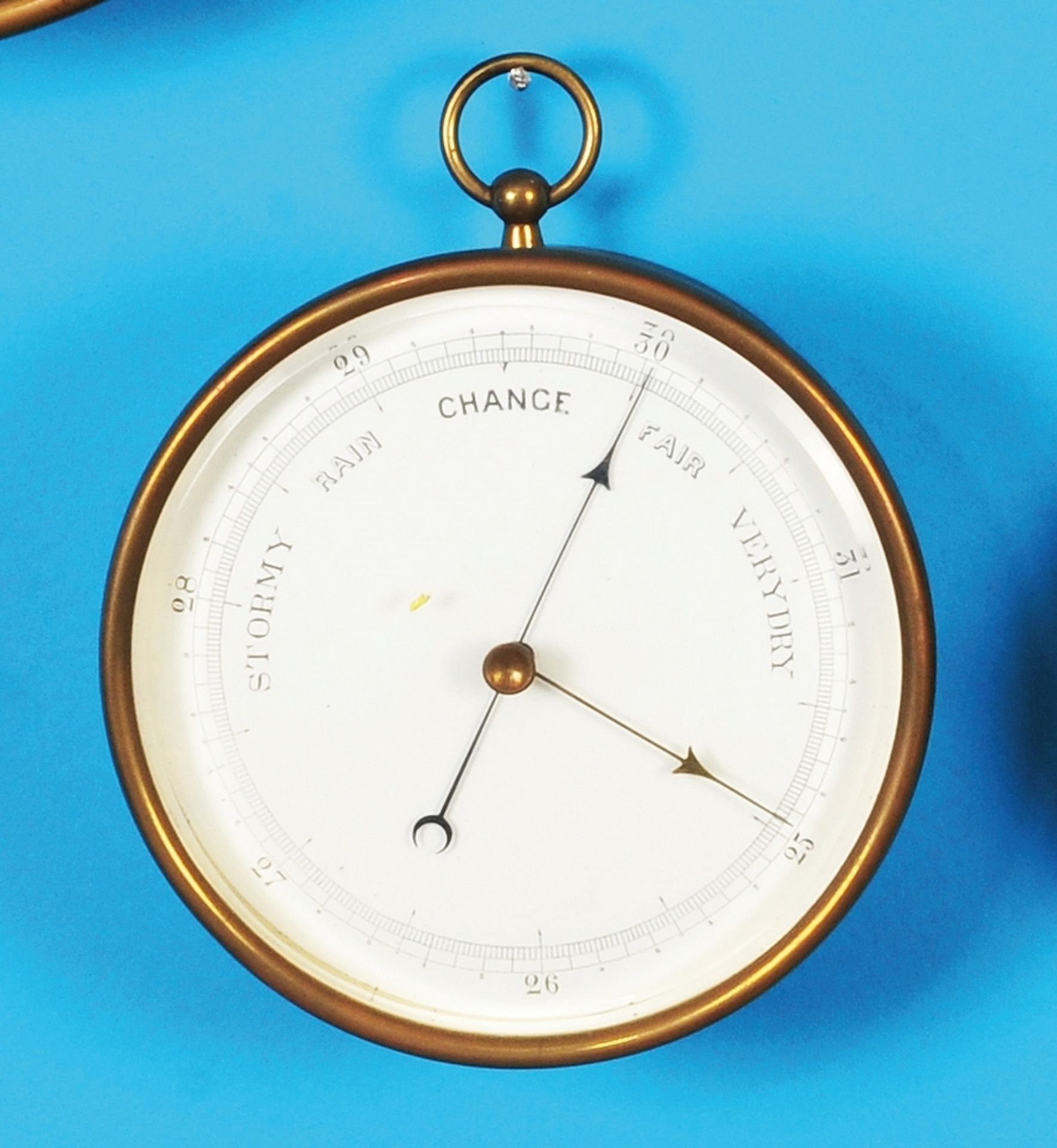 English round barometer with suspension bracket, white dial,