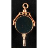 Golden pocket watch key in 14 ct. setting, rotatable