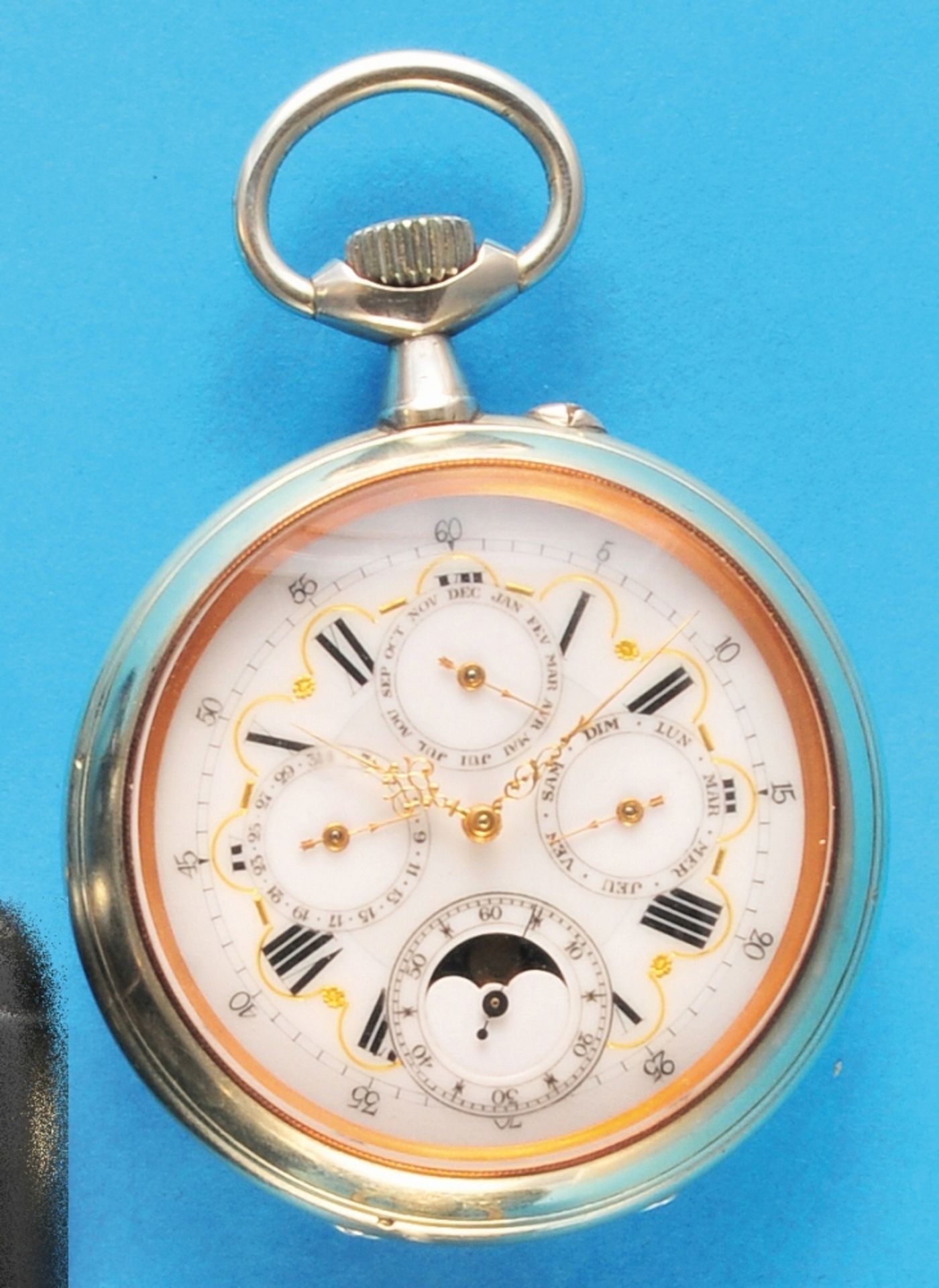 Large metal pocket watch in fine condition with moon phase calendar,