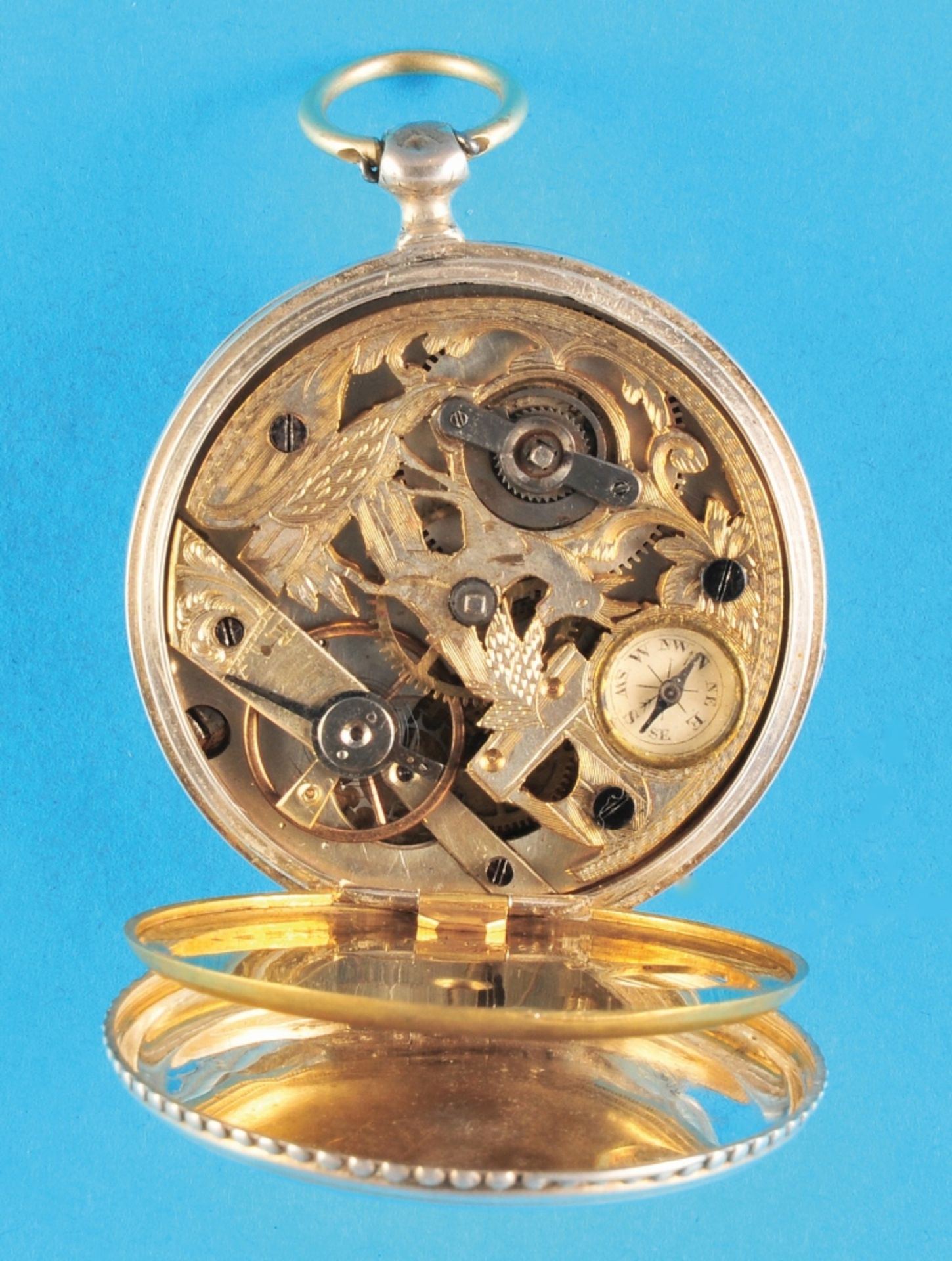 Silver pocket watch with engraved movement and compass, guilloché silver case