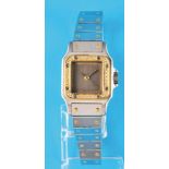 Les Must de Cartier "Santos" Automatic ladies' wristwatch with 18 ct. gold bezel set with 28 diamond