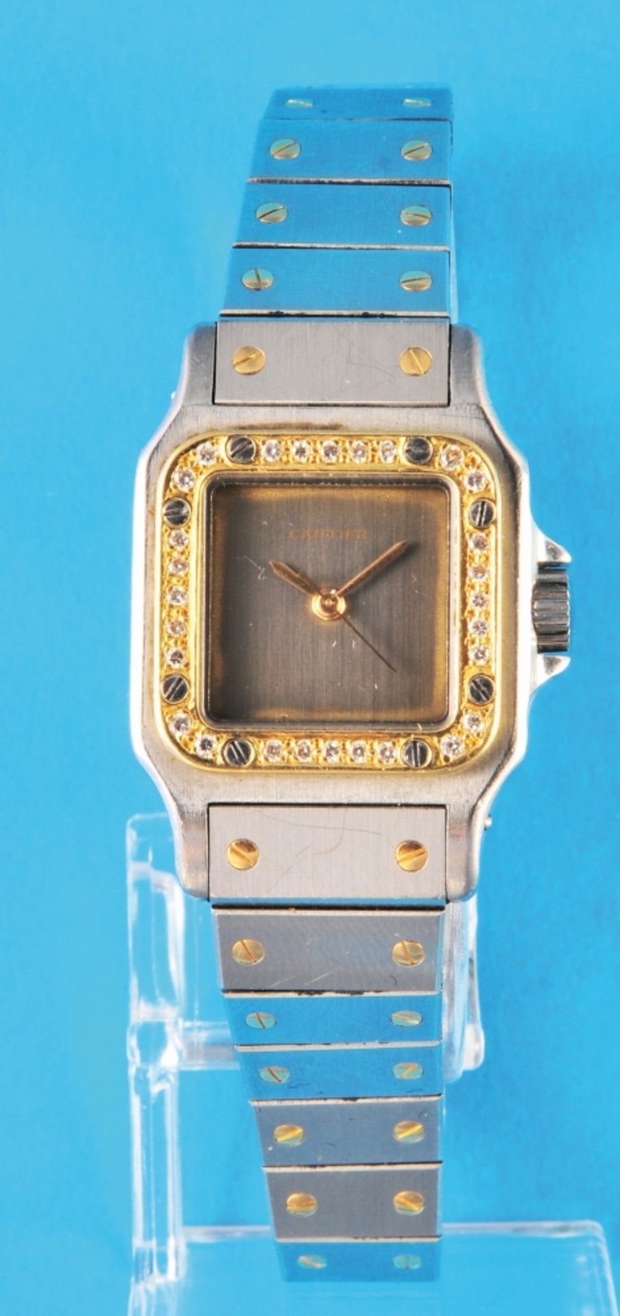 Les Must de Cartier "Santos" Automatic ladies' wristwatch with 18 ct. gold bezel set with 28 diamond