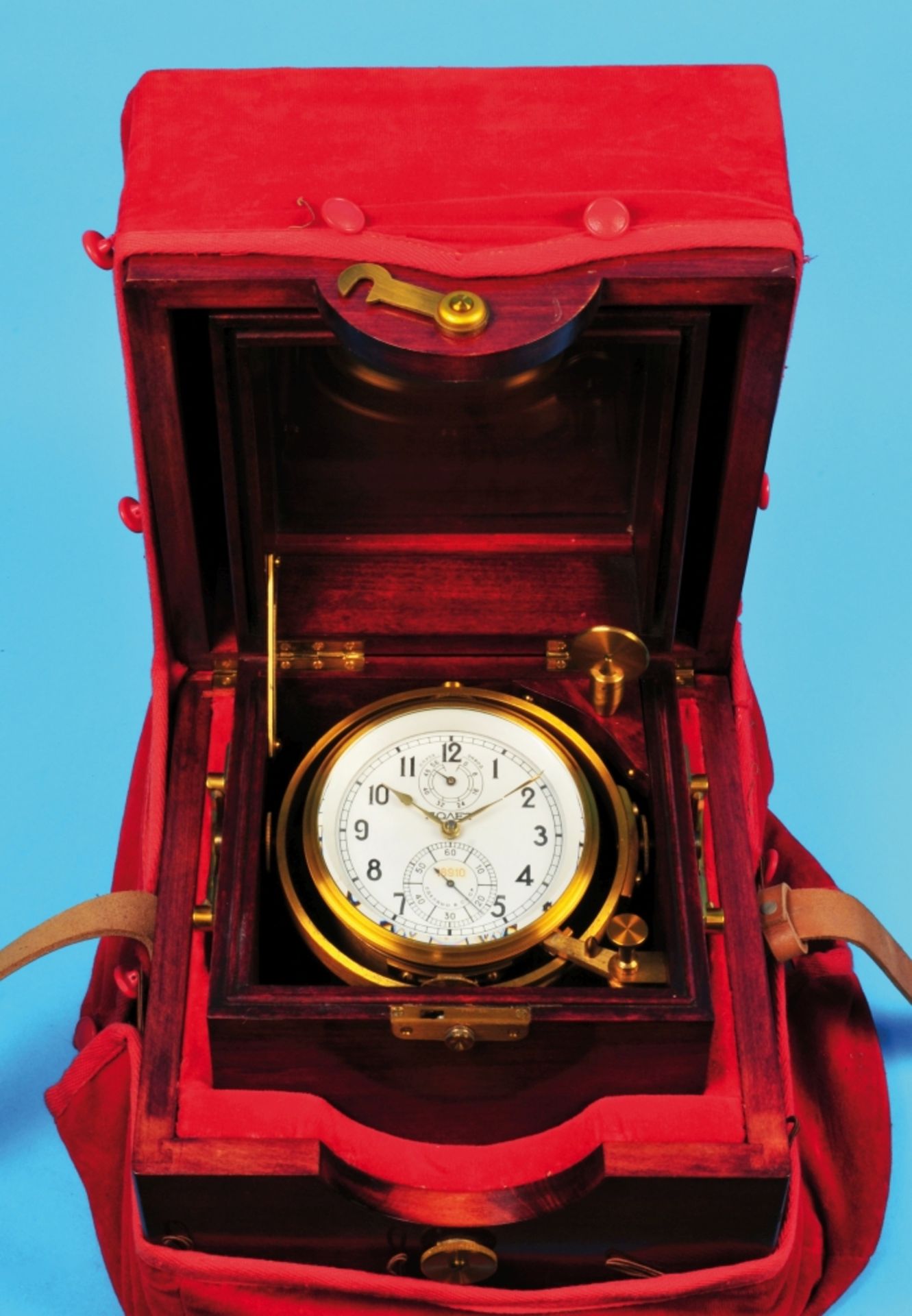 Russian marine chronometer, Poljot, No. 18910, with transport over-case and red velvet cover, 3-piec