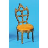 Small pocket watch stand in the shape of a chair, gilded structure with yellow velvet seating surfac