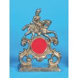 Small pocket watch stand in the form
of a rider, silver plated cast iron construction