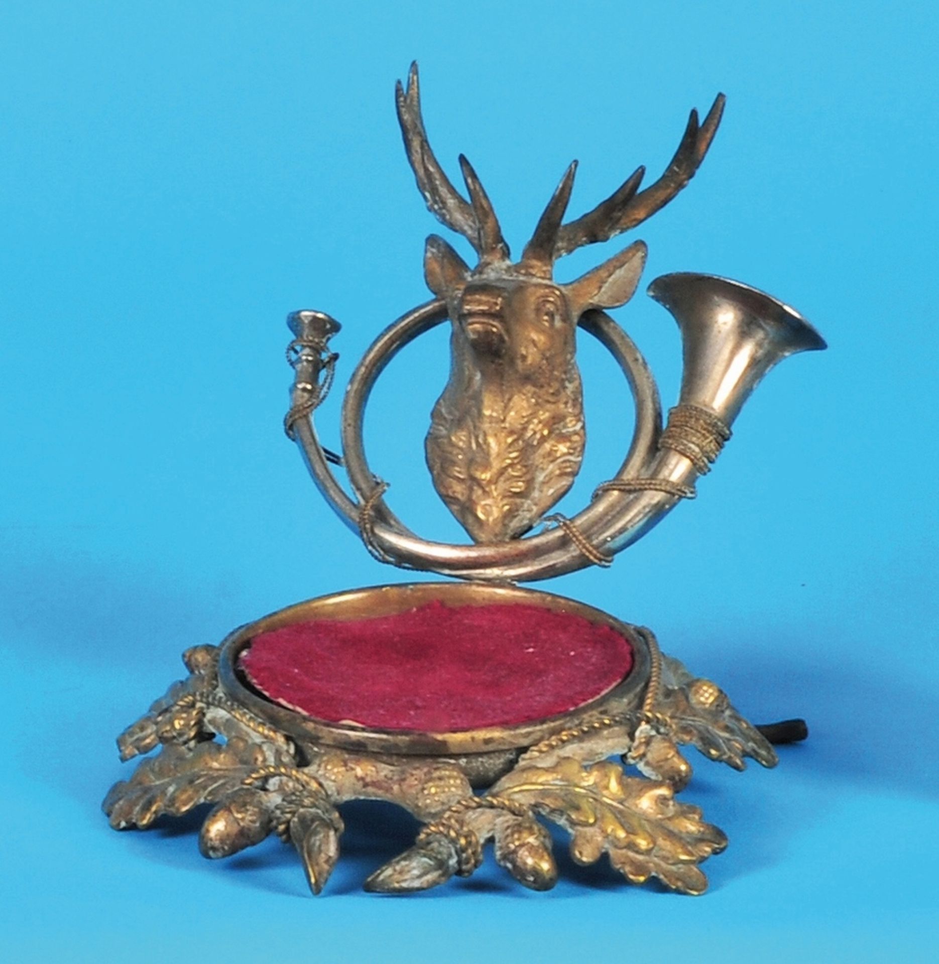 Small pocket watch stand, cast iron version
with foliage, stag's head and blowing horn,