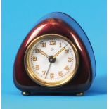 Small Junghans alarm clock, triangular,
anodised metal case, enamel dial with luminous
with luminous