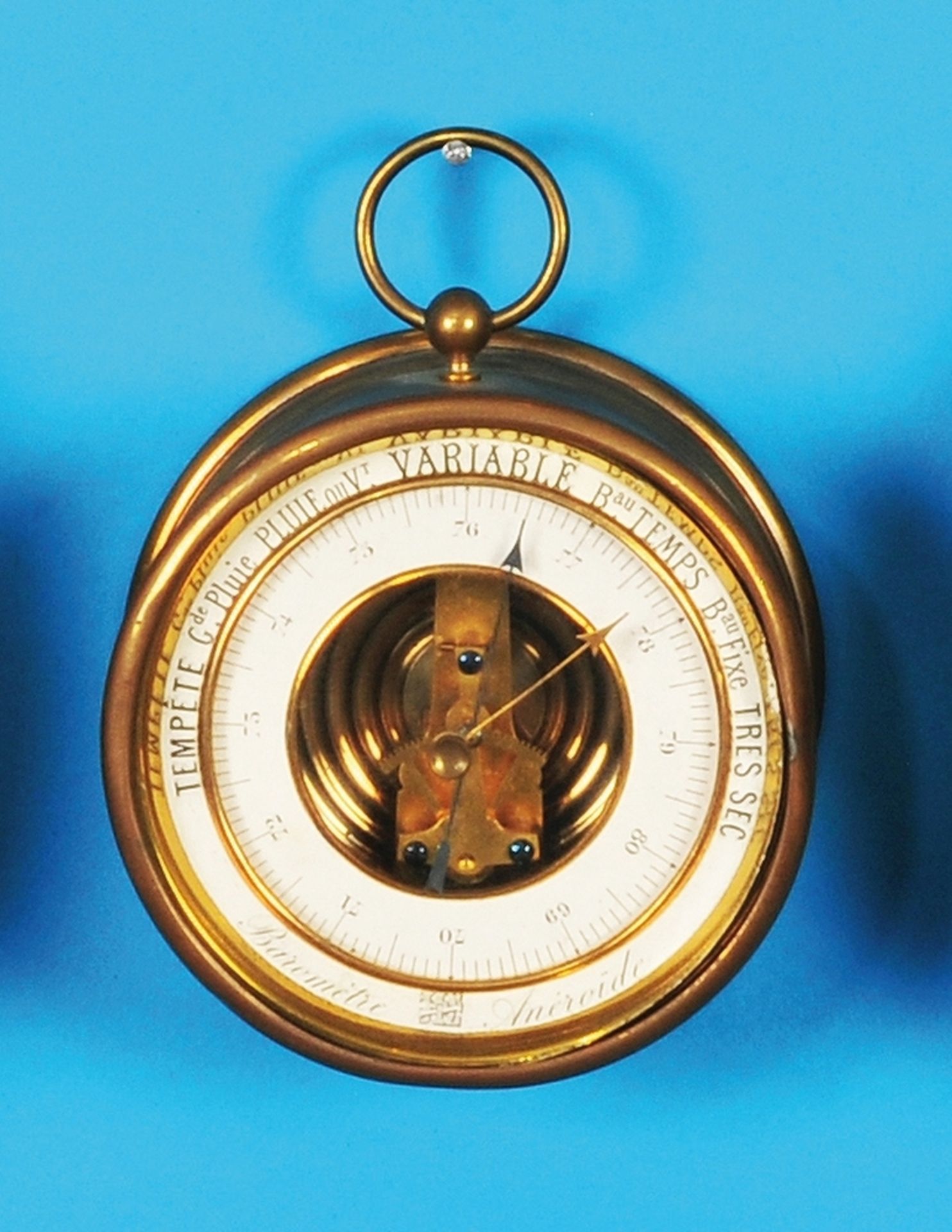 French small round aneroid barometer, round brass case with small feet for standing and carrying bra