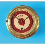 G.U.B. Glashütte ship's wall clock with central second hand, round brass case with solid glass bezel