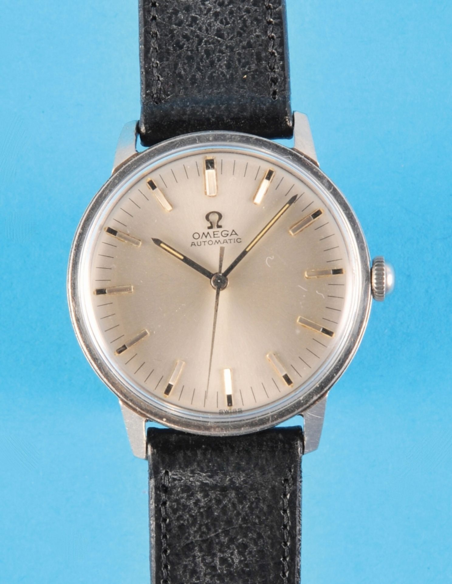 Omega Automatic wristwatch with central second hand and Omega case, reference 165.002, cal. 560, cir