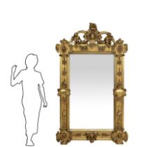 Important mirror in gilded wood with gold leaves, nineteenth century