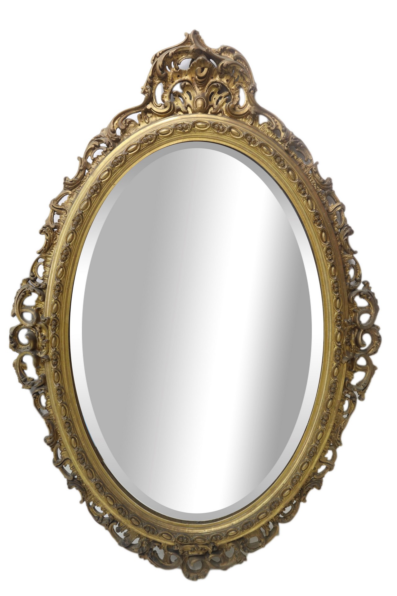 Oval mirror in gilded wood, Late 19th century