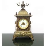 Pendulum table clock. In gilt metal with porcelain dial, Late 19th century