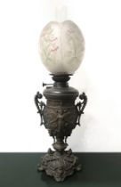 Grade bronze lamp with embossed base decorated with figures of winged women, Late 19th century