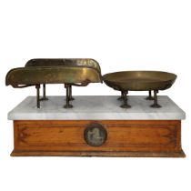 Scale in lacquered wood with marble top and brass plates, Early 20th century