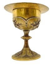 Chalice with paten in silver vermeil embossed with floral motifs, early 20th century. Based on relig