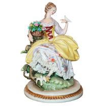 Capodimonte - Porcelain woman with basket of flowers and birds, 20th century