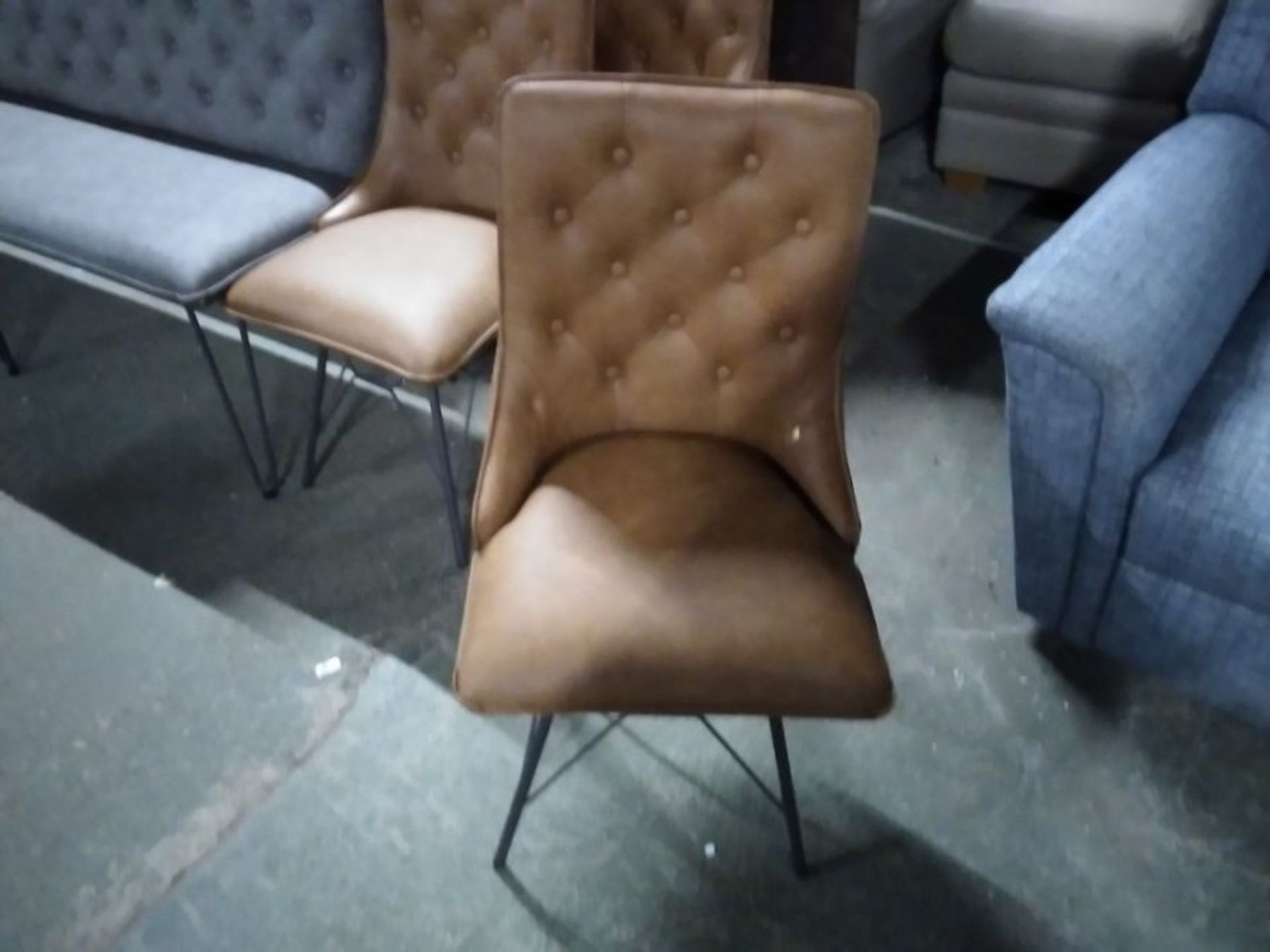 INDUSTRIAL TAN TWISTER CHAIR (RIPPED)