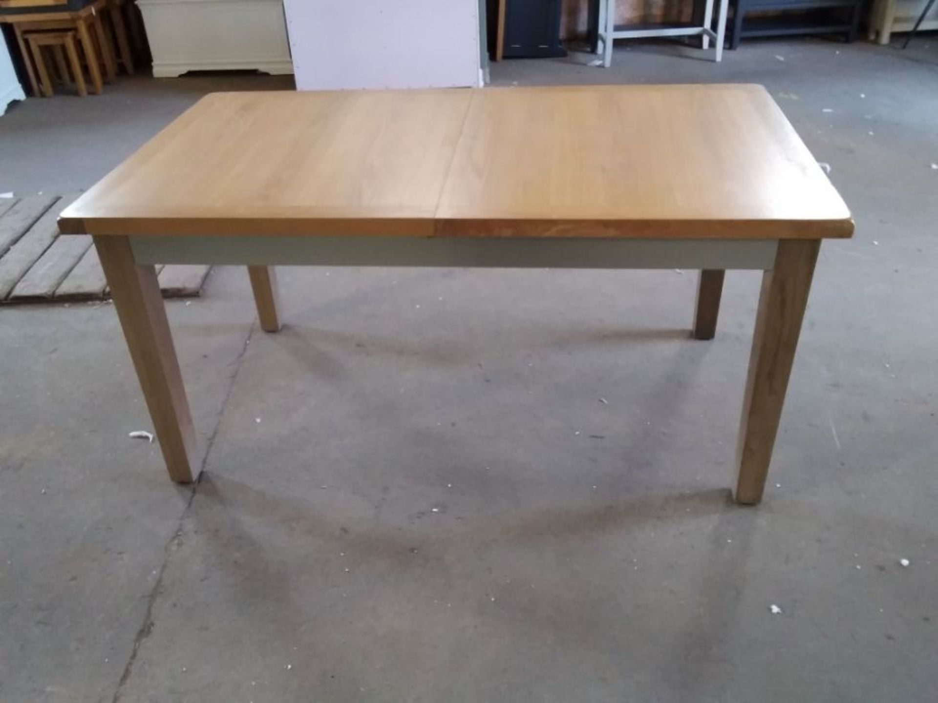 MISMATCHED EXTENDING DINING TABLE