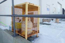 Lot of Cylinder Cage and (4) 20lb Propane Tanks.