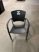 Black Plastic Chair with Arms and Castors