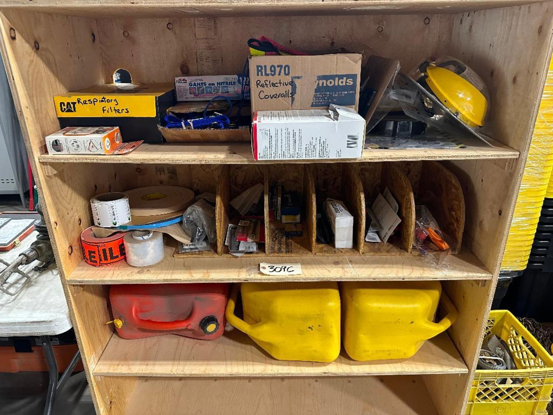 Contents of Wooden Shelf including Fuel Cans, Face Shield Headgear, Straps, etc.