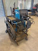 Lot of Miller XMT 450 MPa Welder, Miller 22A Wire Feeder, Cords and Hoses, Steel Cart, etc.