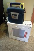 Powerheart G3 AED Defibrillator w/Wall Cabinet.