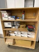 Contents of Shelf Including Table Cloths, Paper Towel Dispensers, Fasteners, etc.