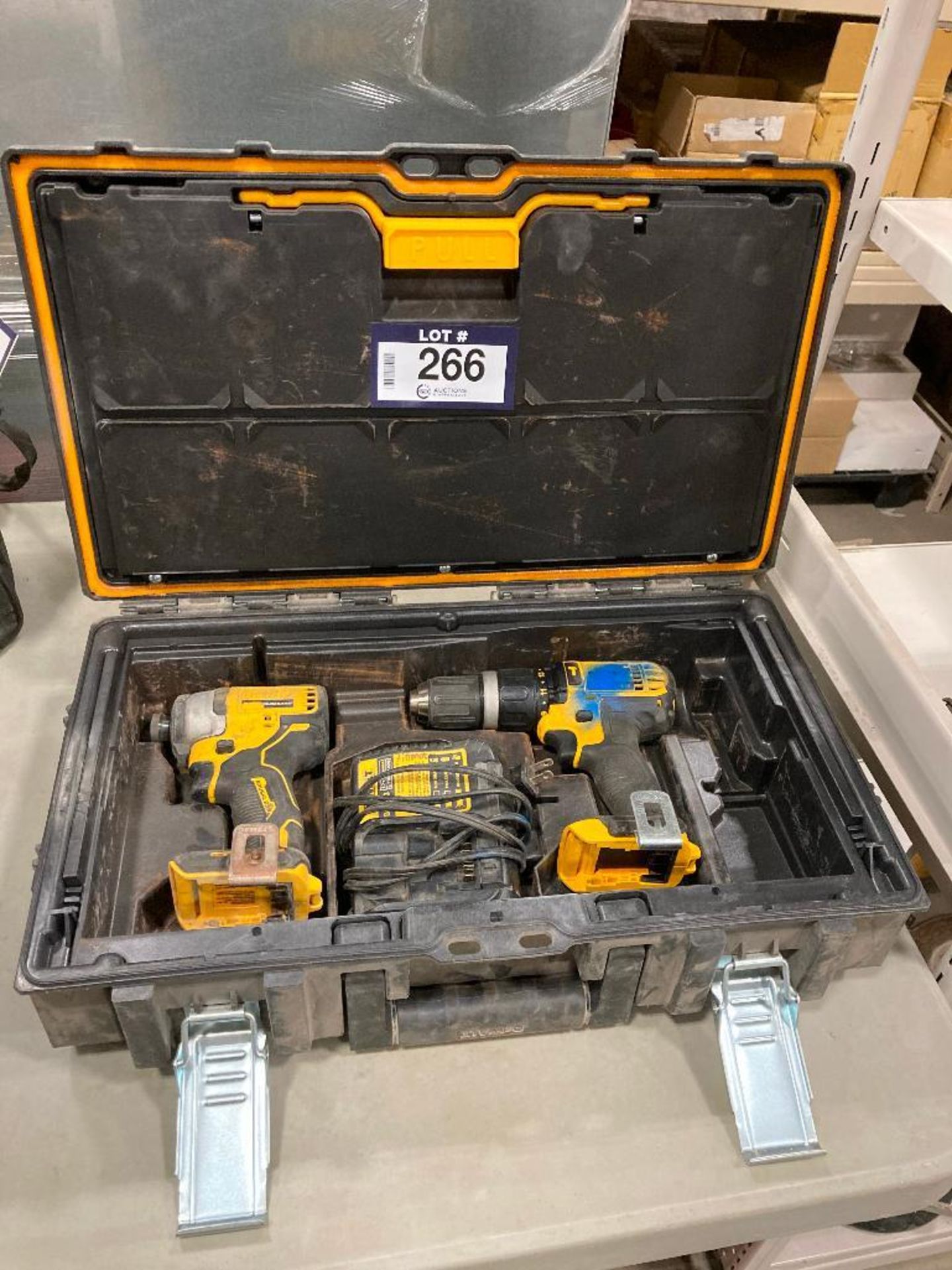 DeWalt Toolbox Including: (1) 1/2" Hammer Drill, (1) 1/4" Impact Drill and (1) Battery Charger