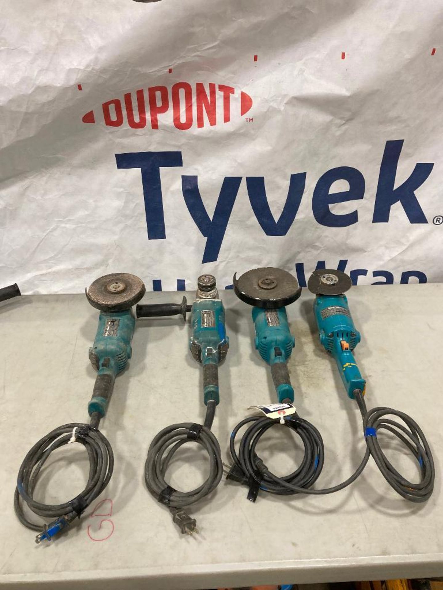 Lot of (4) Asst. Makita Angle Grinders