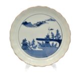 A JAPANESE BLUE AND WHITE ARITA PORCELAIN FLUTED DISH, EDO PERIOD, MID 18TH CENTURY
