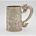 A CHINESE EXPORT SILVER ‘DRAGON’ TANKARD, QING DYNASTY, 19TH CENTURY