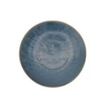 A CHINESE EXPORT ZHANGZHOU ‘SWATOW’ BLUE-GLAZED PORCELAIN CHARGER, LATE 16TH/EARLY 17TH CENTURY