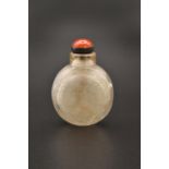 A CHINESE ROCK-CRYSTAL ‘MEXICAN COIN’ SNUFF BOTTLE, QING DYNASTY, EARLY 19TH CENTURY