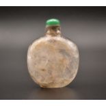A CHINESE ‘RUSTIC CRYSTAL MASTER’ CARVED SNUFF BOTTLE, QING DYNASTY, 19TH CENTURY