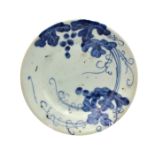 A JAPANESE ARITA BLUE AND WHITE PORCELAIN ‘FRUITING VINE’ DISH, LATE 17TH CENTURY
