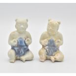 TWO CHINESE BLUE AND WHTE PORCELAIN ‘CA MAU’ SHIPWRECK MODELS OF BOYS, KANGXI PERIOD, CIRCA 1725