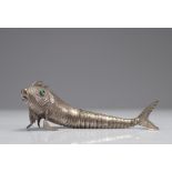 Articulated silver metal fish with stone-encrusted eyes