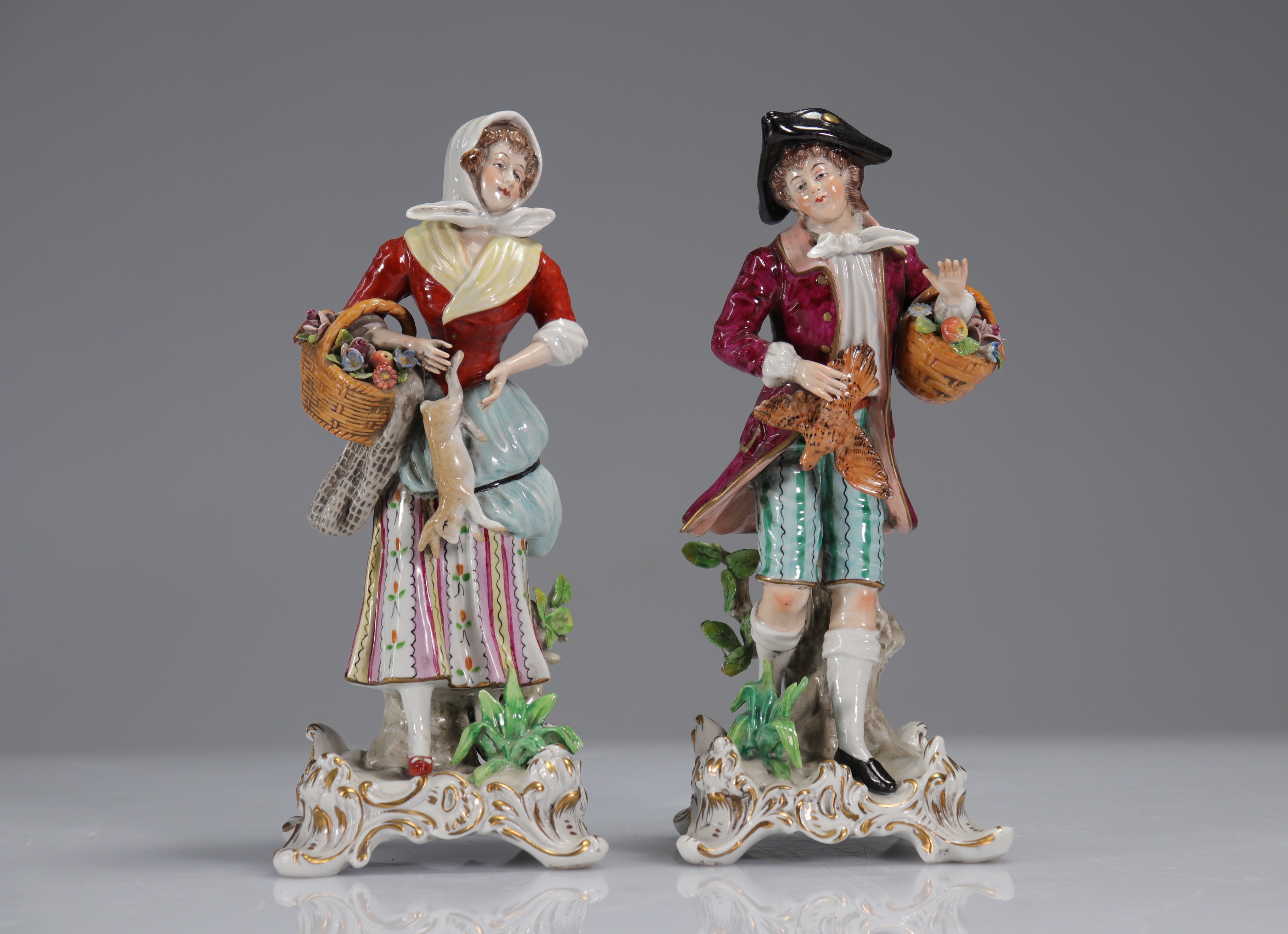 Pair of Capodimonte porcelain statues