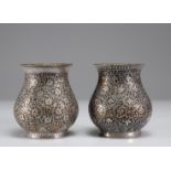 Pair of Persian vases with floral decoration and silver inlays