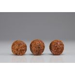 Set of (3) carved nuts Chinese work