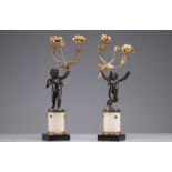 Pair of bronze candlesticks with two Louis XV style patinas