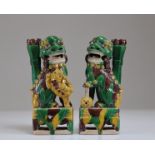 Pair of Fo dog incense holders in 18th century enamelled sandstone