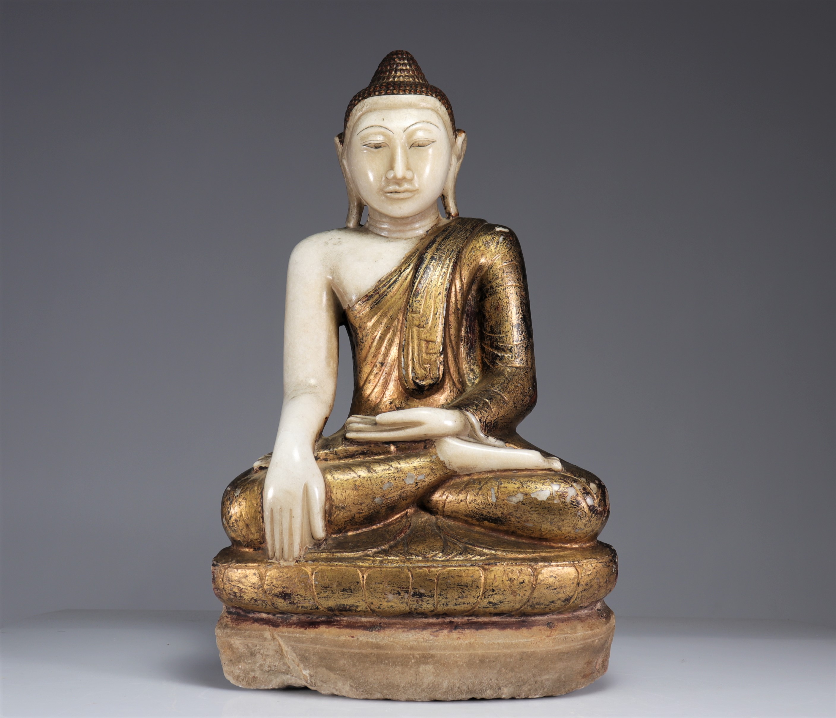 Burmese marble statue in polychrome white marble representing Sakyamuni Buddha, 17th century.