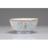 Porcelain bowl famille rose blue background decorated with flowers