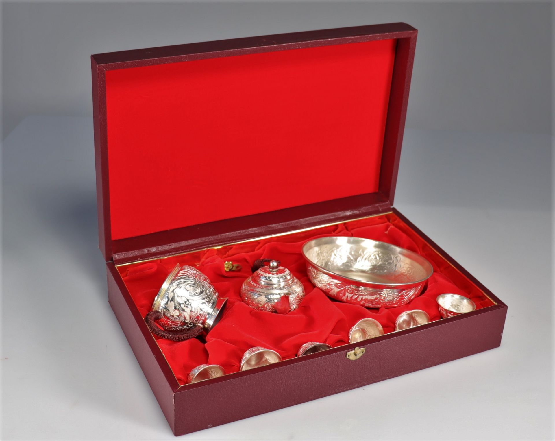 Sterling silver tea service decorated with 20th century dragons