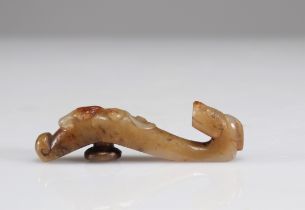 Jade fibula carved with a dragon's head and a Qing dynasty qilong