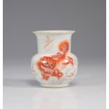 Chinese porcelain vase decorated with "iron red" dogs