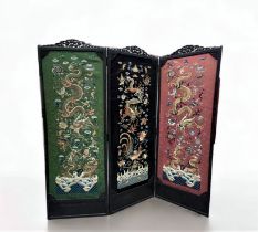 Chinese screen decorated with dragons and embroidered phoenix